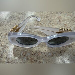 Elegant Gold and Gray Women's Sunglasses Loewe